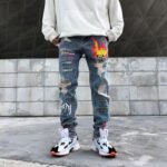 Graffiti ripped jeans - Image 3