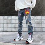 Graffiti ripped jeans - Image 4